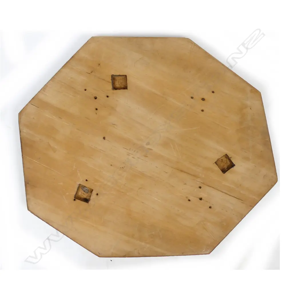 An octagonal carved tabletop Image 1++