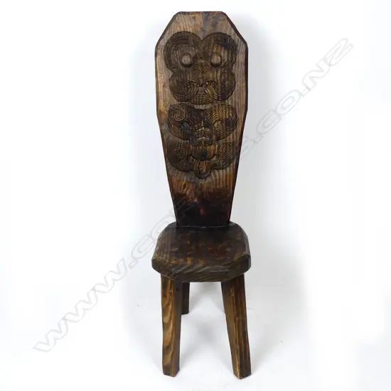 A folk art pine spinning chair