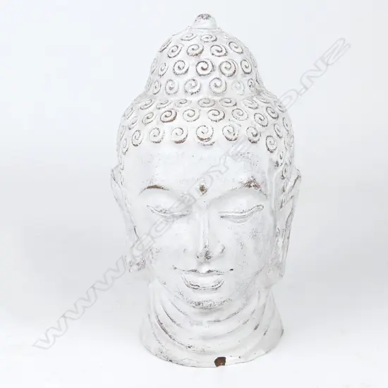 A cast earthenware buddha head