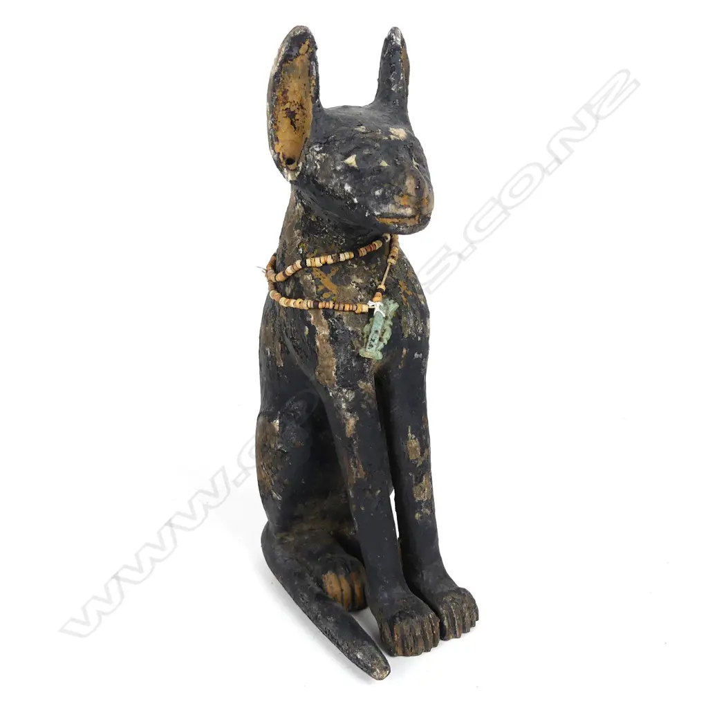An Egyptian wooden carved cat Image 1++