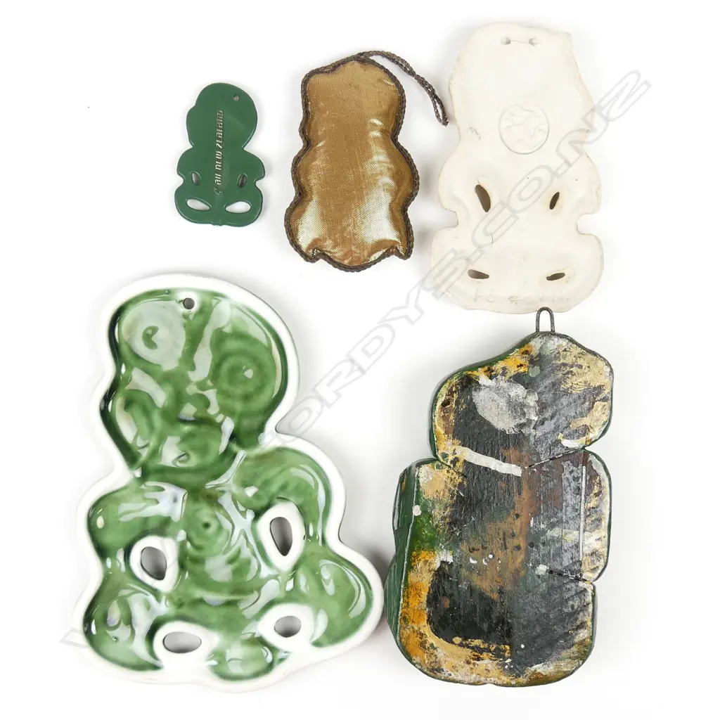 A collection of five various tiki Image 1++