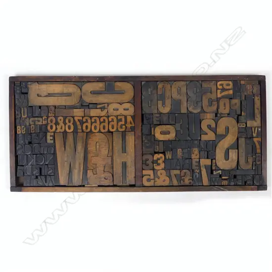 A tray of wooden printer's type