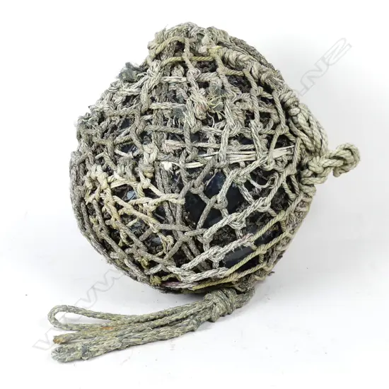 A large glass fishing float