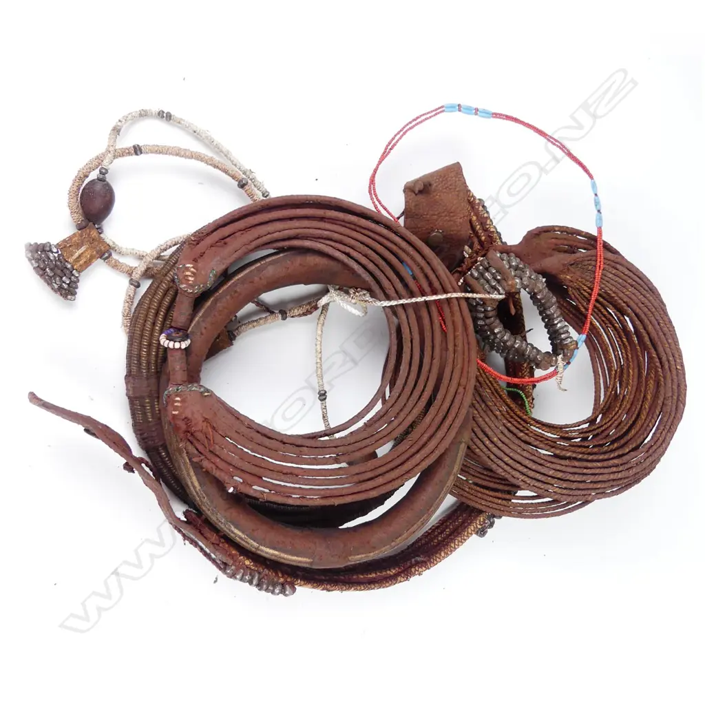 A collection of Himba tribal necklaces and belt Image 1++