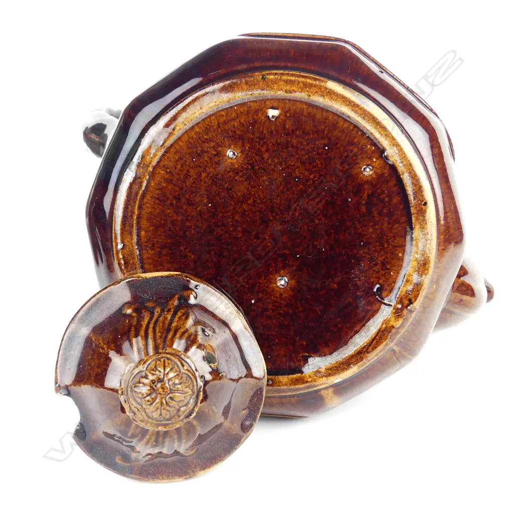 A Victorian Rockingham glazed 'Rebecca At the Well' teapot Image 1++