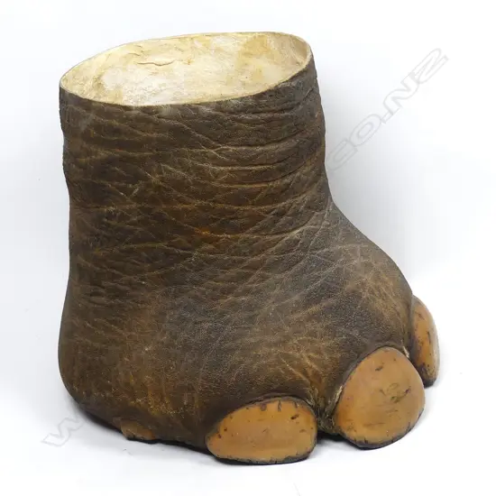 An elephant foot wastepaper bin