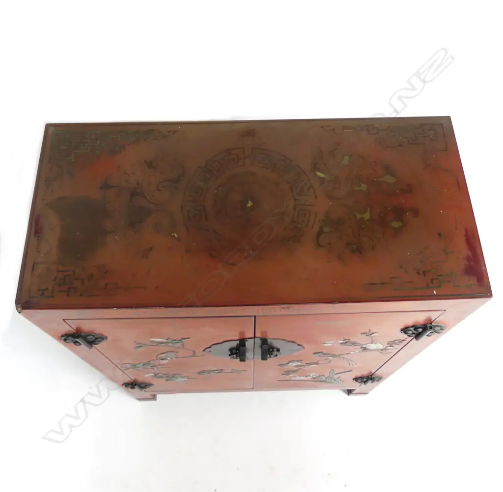A Chinese small lacquered two door cabinet Image 1++