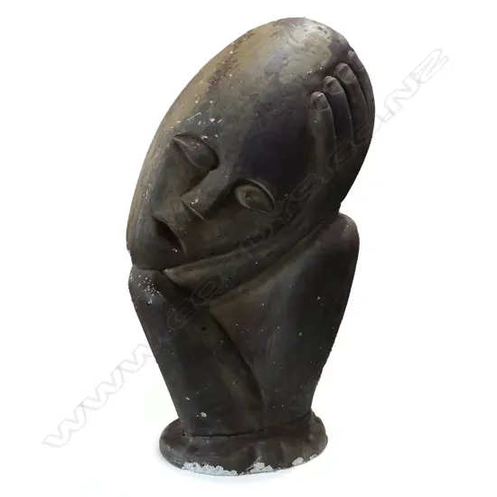 A concrete garden sculpture