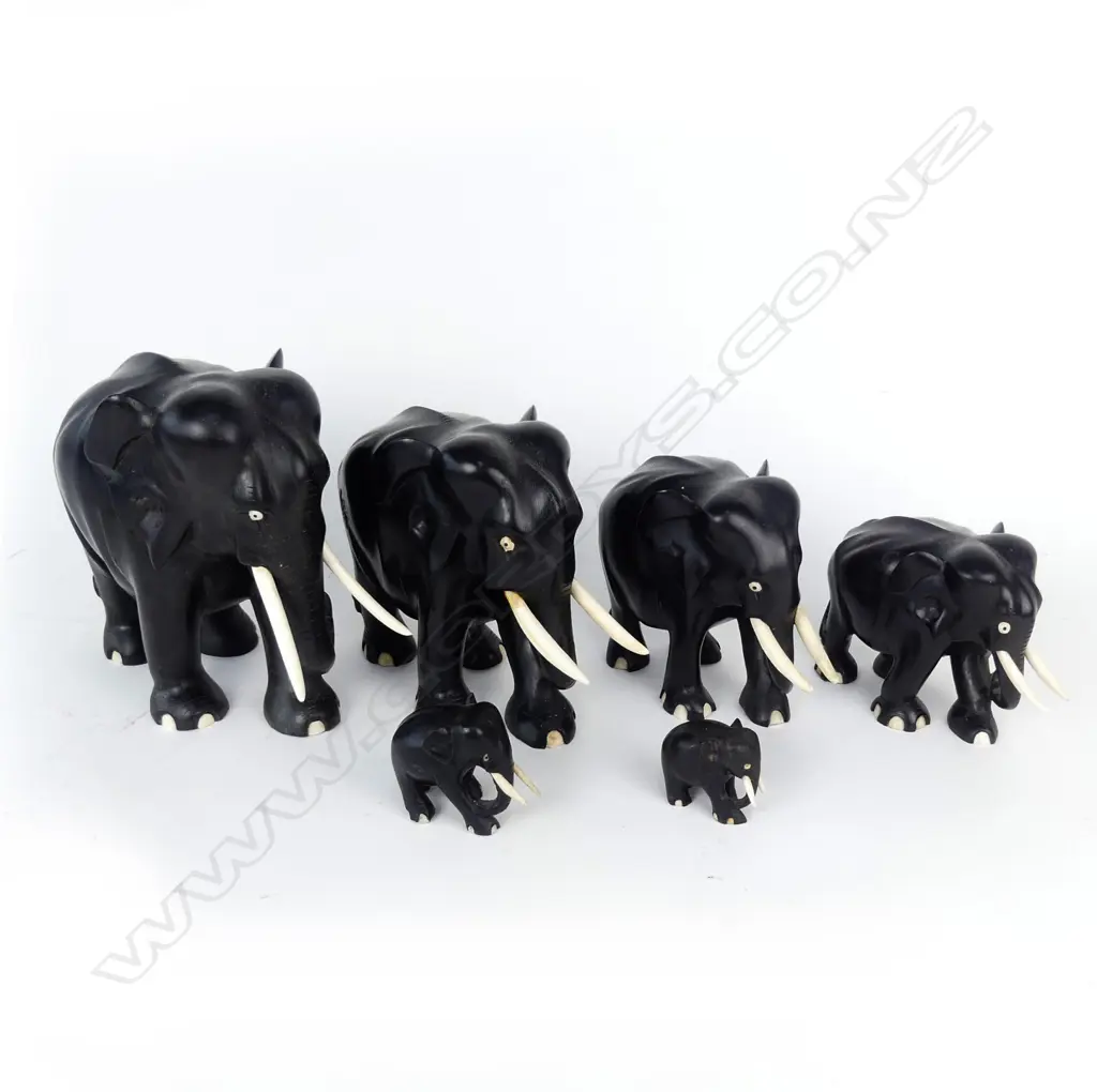 A graduated set of six ebony elephants Image 1++