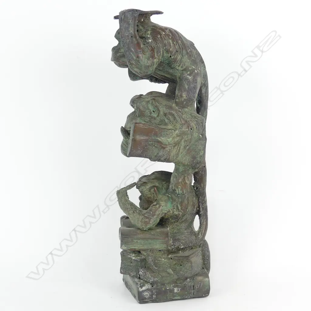 A bronze sculpture of three wise monkeys Image 1++