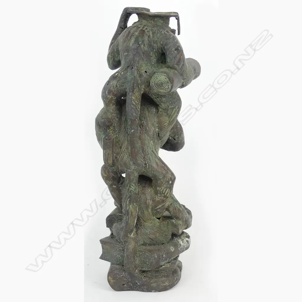 A bronze sculpture of three wise monkeys Image 1++