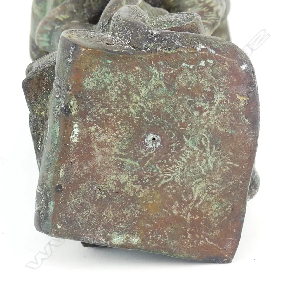 A bronze sculpture of three wise monkeys Image 1++