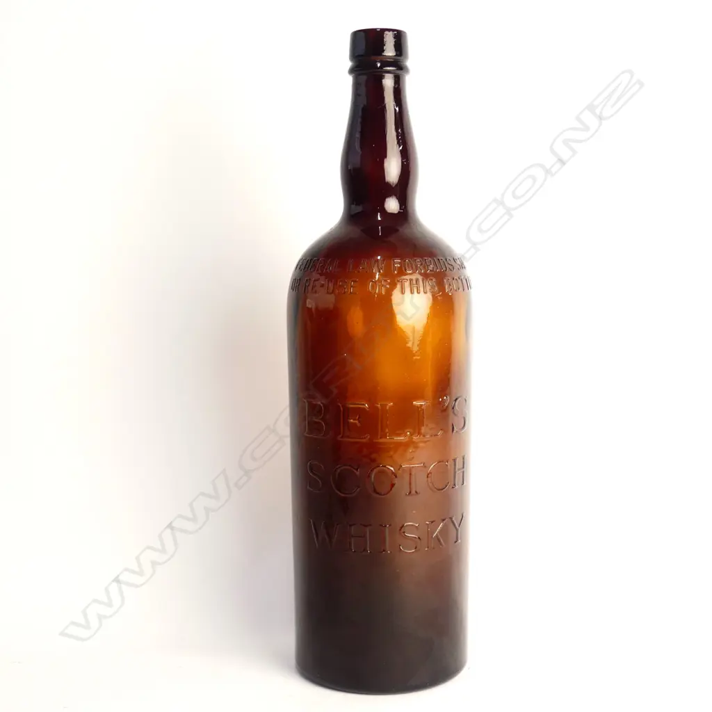 A large old Bell's Scotch Whisky bottle Image 1++