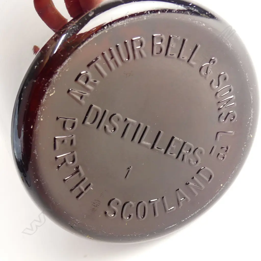 A large old Bell's Scotch Whisky bottle Image 1++