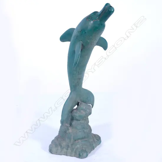A green patinated bronze dolphin fountain capital