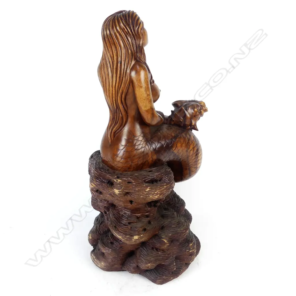 A large hardwood carving of a mermaid Image 1++