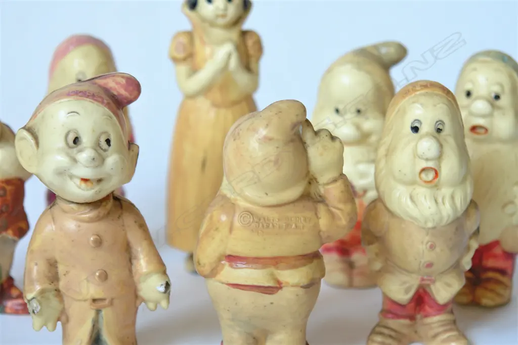 A vintage Japanese celluloid Walt Disney Snow White and the Seven Dwarfs toy set Image 1++