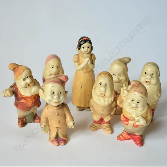 A vintage Japanese celluloid Walt Disney Snow White and the Seven Dwarfs toy set