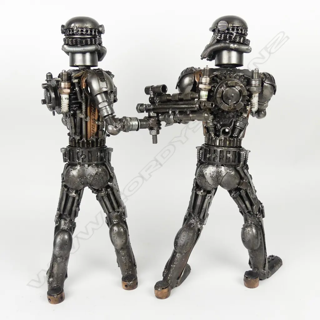 A pair of recycled metal Star Wars Storm Trooper figures Image 1++