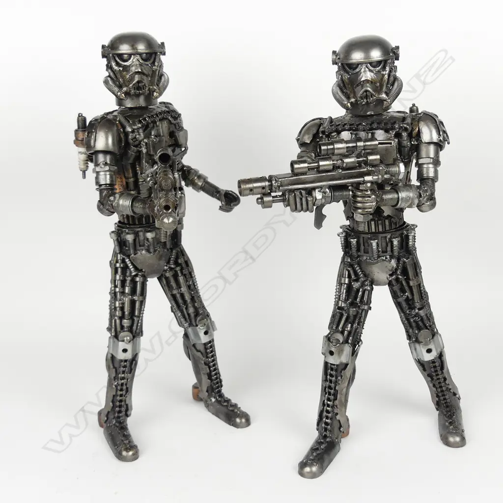 A pair of recycled metal Star Wars Storm Trooper figures Image 1++
