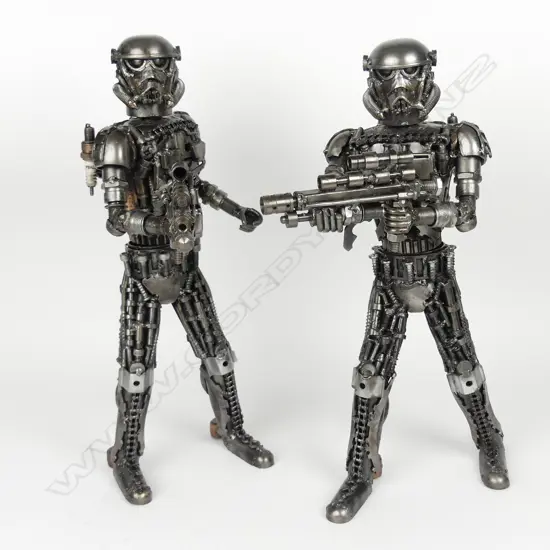 A pair of recycled metal Star Wars Storm Trooper figures