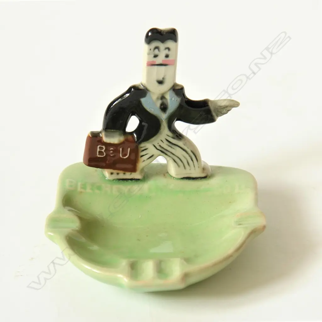 An uncommon Crown Lynn advertising ashtray Image 1++