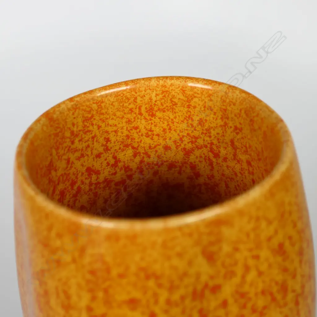 A Pilkington’s Royal Lancastrian vase with squat ovoid lobed base, orange glaze with mottled red and dark highlights, impressed mark. H.165mm. Image 1++