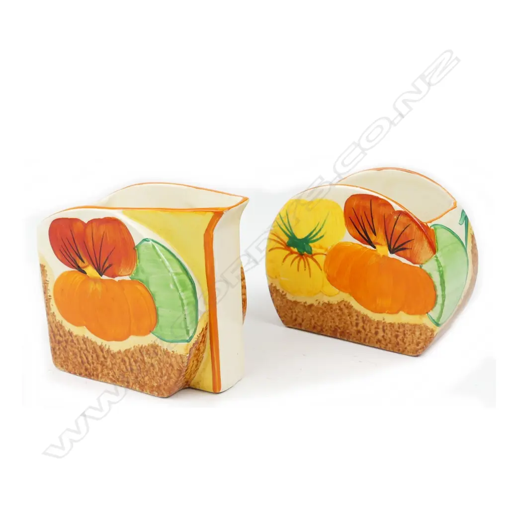 A Clarice Cliff Bizarre cream and sugar Image 1++