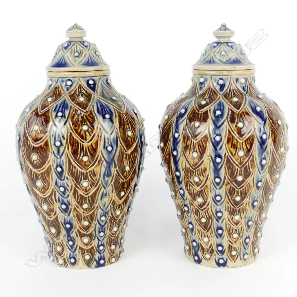 A pair of Doulton Lambeth lidded baluster urns Image 1++