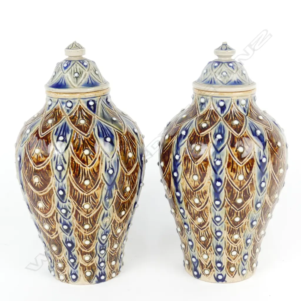 A pair of Doulton Lambeth lidded baluster urns Image 1++