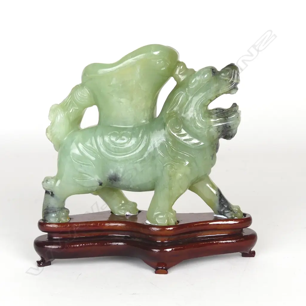 A Chinese jade lion dog libation cup Image 1++