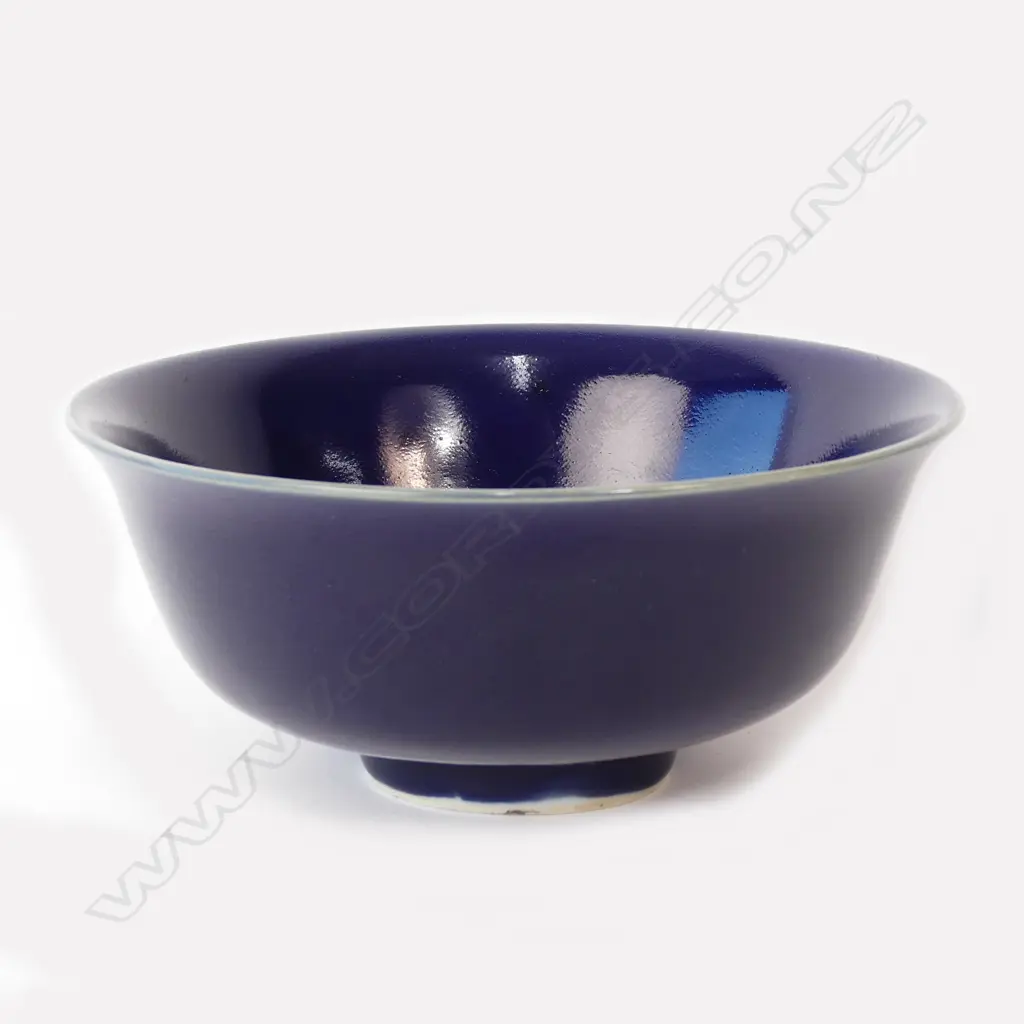 A Chinese monochrome blue glazed footed bowl Image 1++