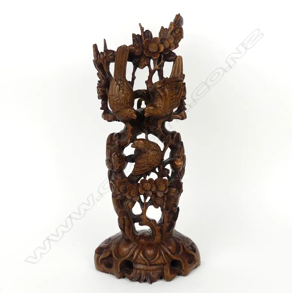 A Japanese hardwood carved standing sculpture of five birds amongst blossoms Image 1++