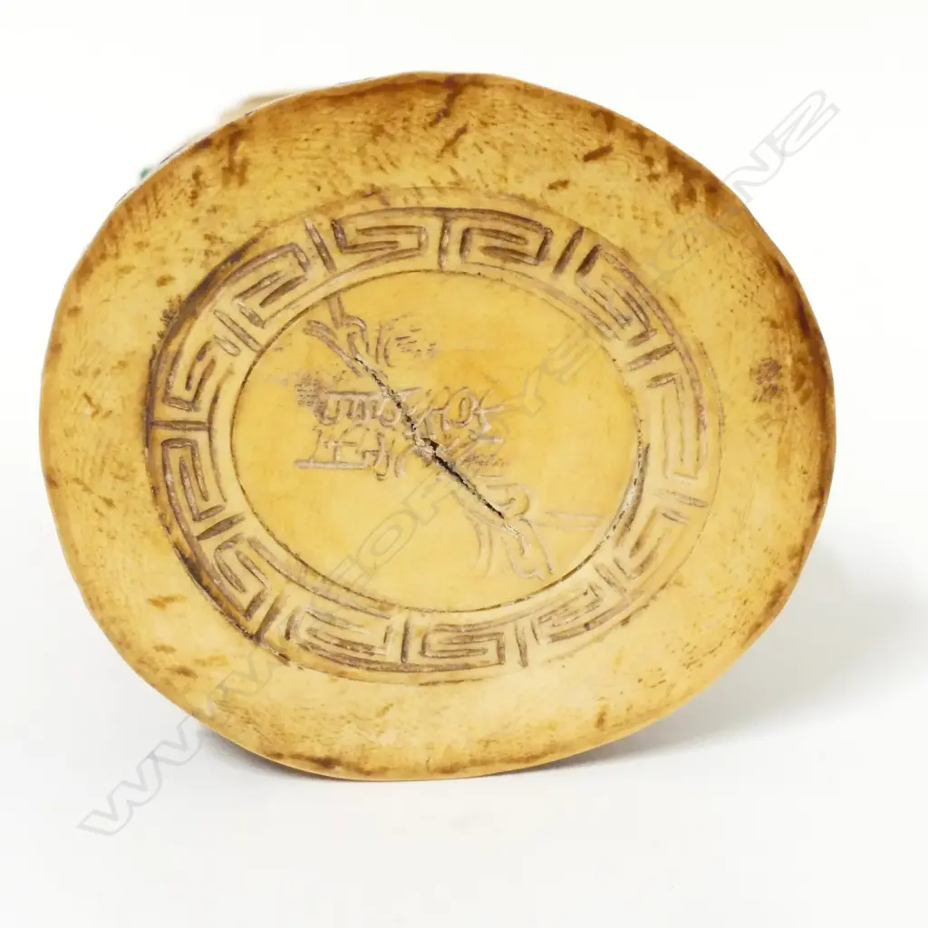 A carved ivory tusk section Image 1++