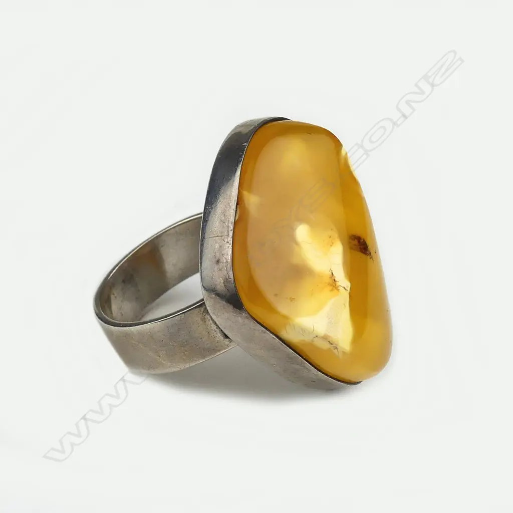 An amber and silver ring Image 1++