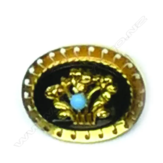 An antique 20ct. gold and onyx brooch