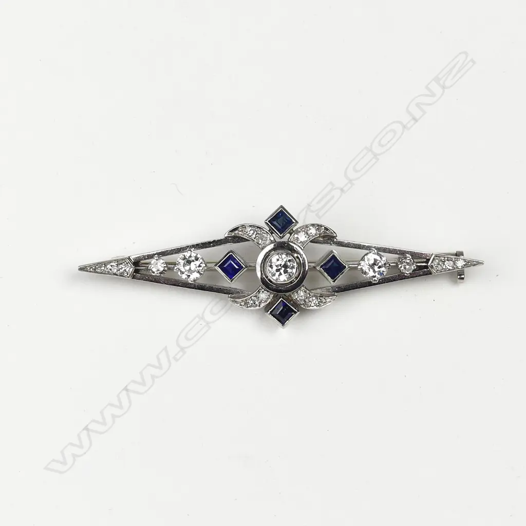 A platinum Art Deco style diamond and sapphire brooch Image 1++