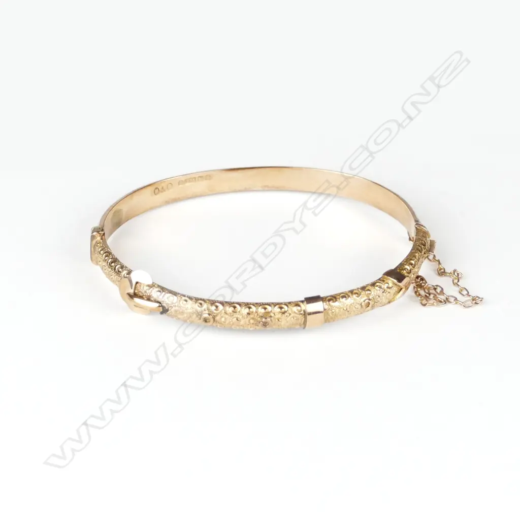 A c.1900 English 9ct. rose gold hinged bangle Image 1++