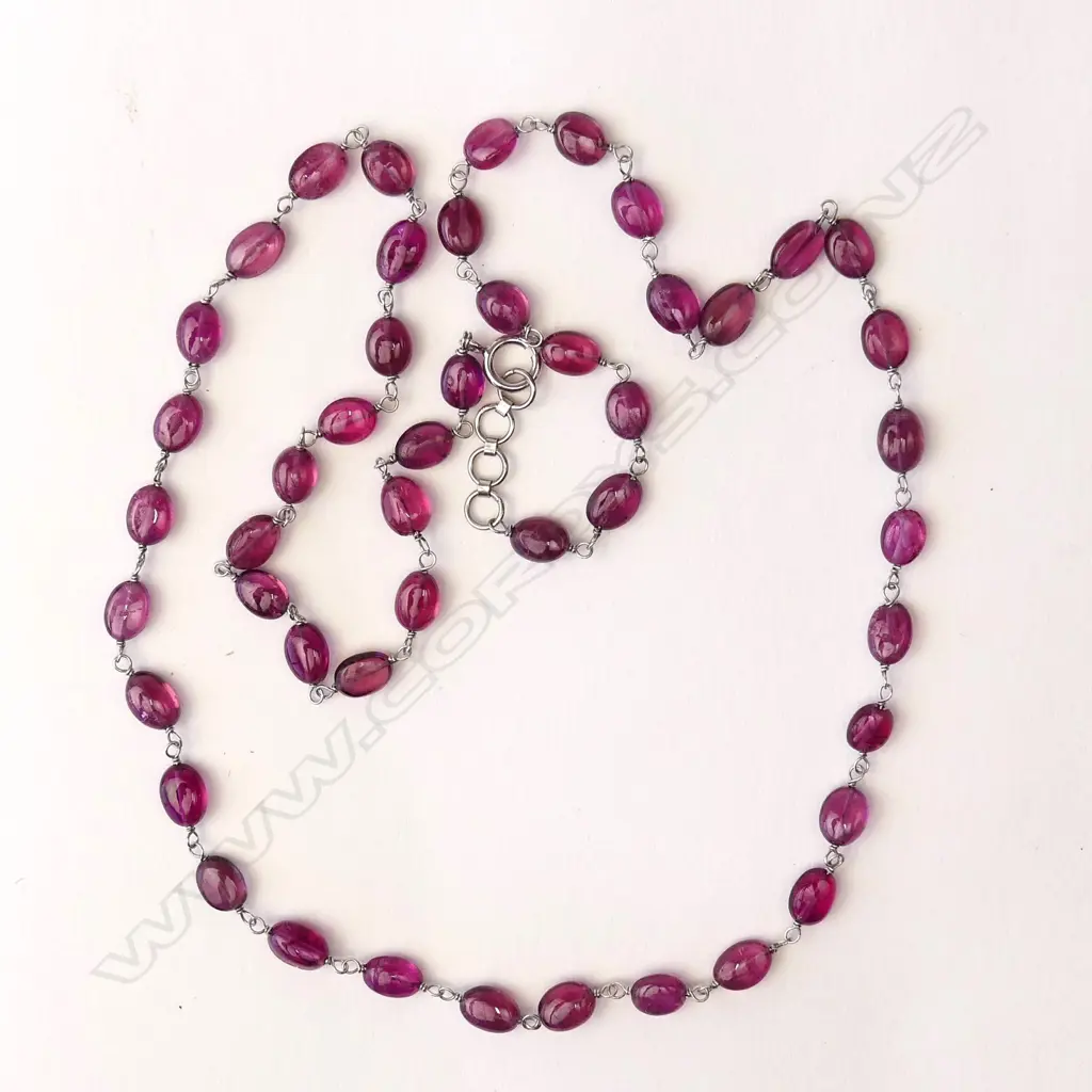 An 18ct white gold and pink sapphire bead necklace Image 1++
