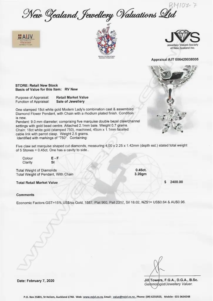 An 18ct. white gold and diamond star form pendant on an 18ct. fine chain Image 1++