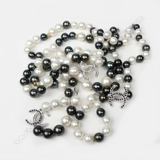 An impressive 14ct white gold diamond and pearl necklace