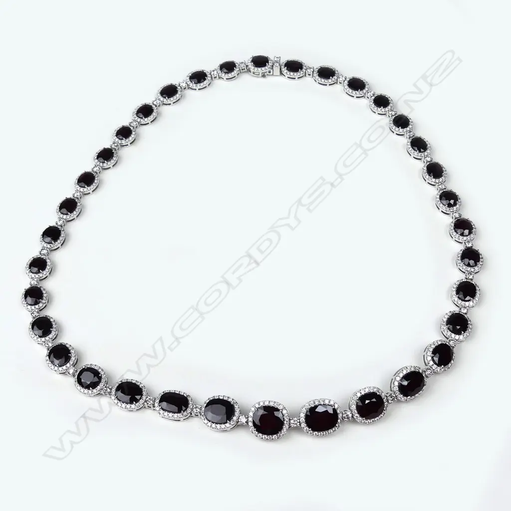 A platinum ruby and diamond necklace Image 1++