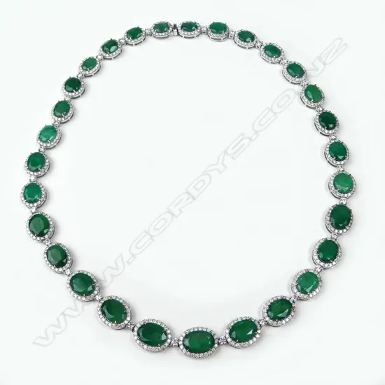 A platinum emerald and diamond necklace