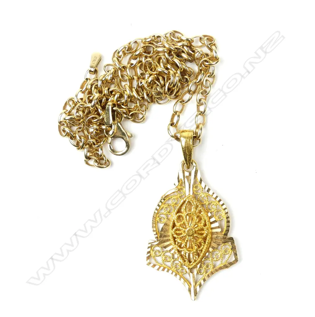 22ct yellow gold pendant on silver gilt chain Image 1++