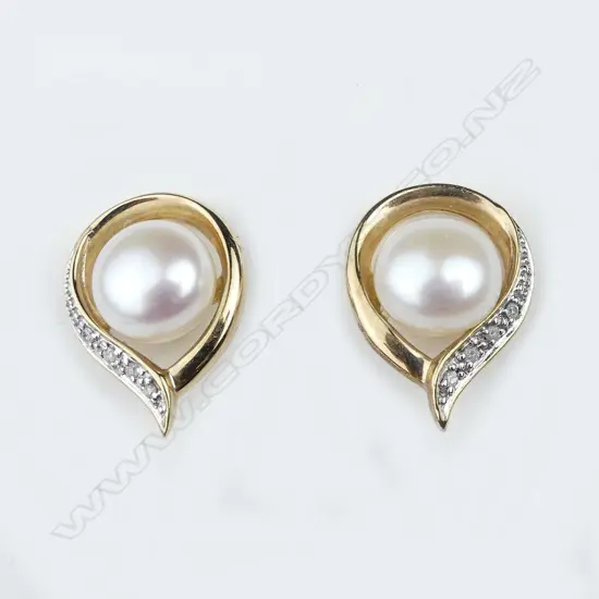 A pair of 9ct gold pearl and diamond earrings