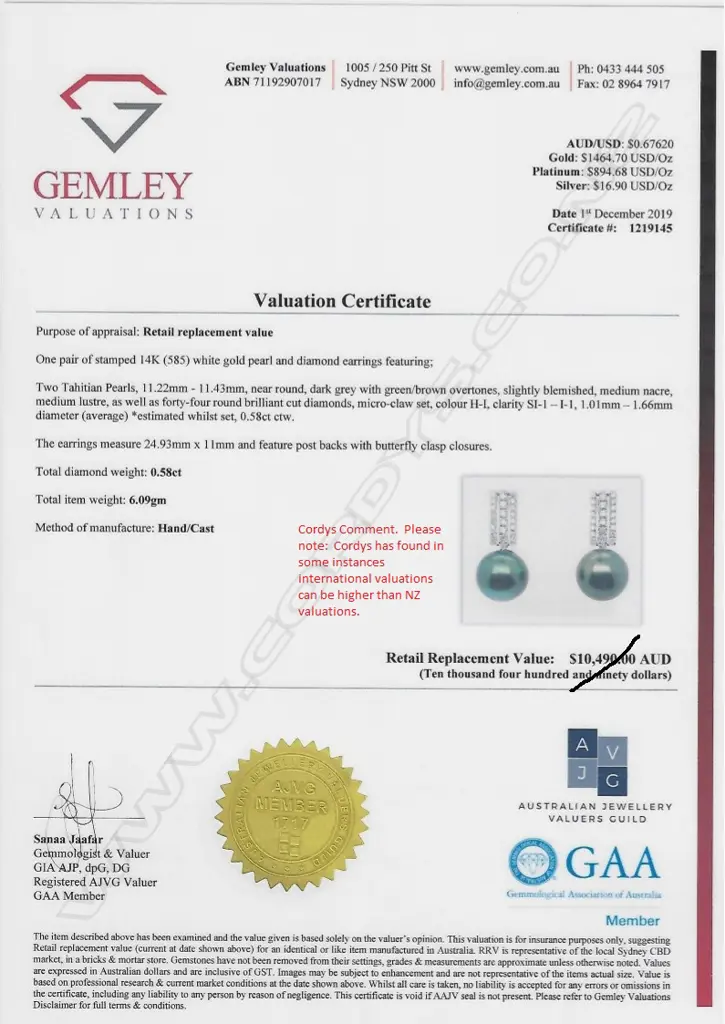 A pair of 14ct white gold pearl and diamond drop earrings Image 1++