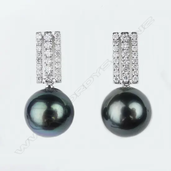 A pair of 14ct white gold pearl and diamond drop earrings