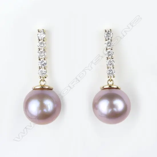 A pair of 14ct gold pearl and diamond earrings