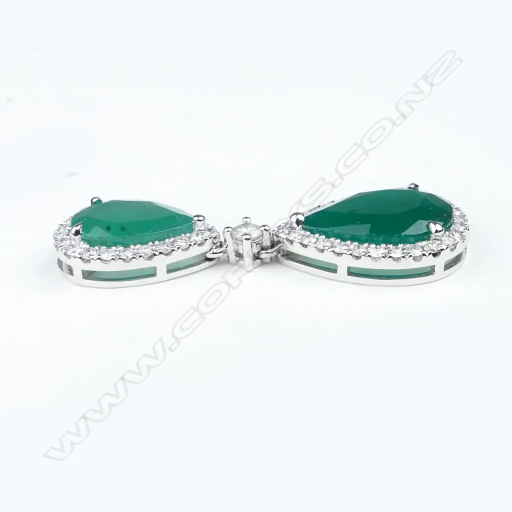 A pair of platinum emerald and diamond drop earrings Image 1++