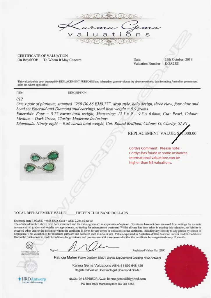 A pair of platinum emerald and diamond drop earrings Image 1++